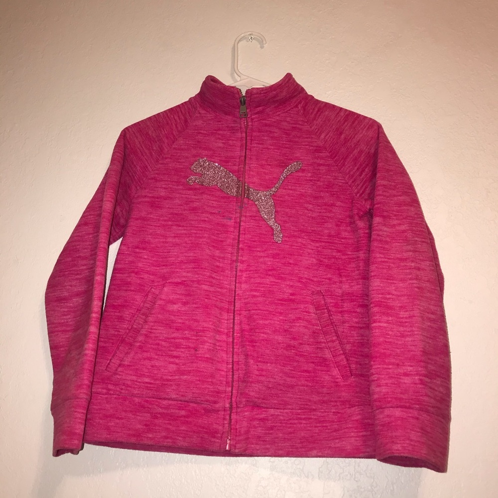 A pink puma sweater
